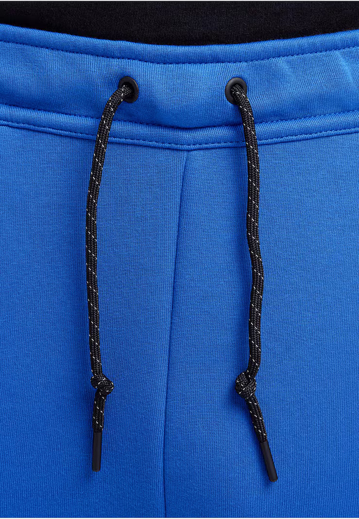 NIKE Tapered Pants in Royal Blue