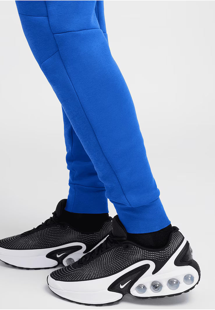 NIKE Tapered Pants in Royal Blue