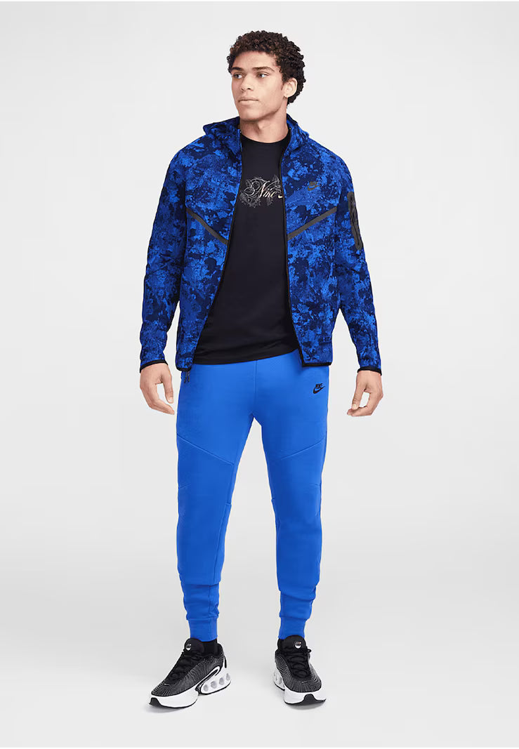 NIKE Tapered Pants in Royal Blue